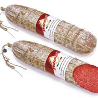 Hungarian salami, natural casings tied to a whole hand