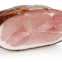 High quality brusà cooked ham tied in half